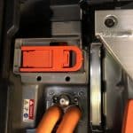 Electric vehicle battery compartment with orange cables
