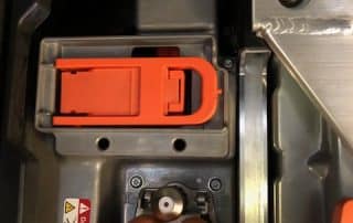 Electric vehicle battery compartment with orange cables