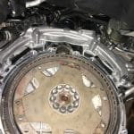 Car engine flywheel and transmission assembly close-up