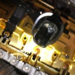 Close-up of engine interior with motor oil
