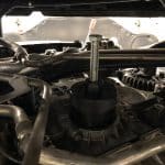 Automotive puller tool on engine component