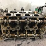 Exposed car engine cylinder head with camshafts