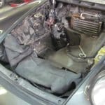 Empty car engine bay without engine installed
