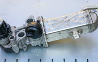 Automotive EGR valve and cooler assembly