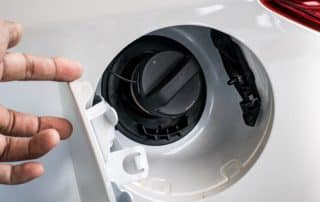 Hand opening car fuel door and gas cap