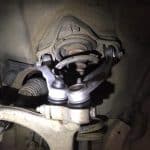 Close-up of car suspension and ball joint assembly