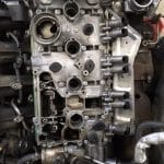 Exposed car engine cylinder head with components