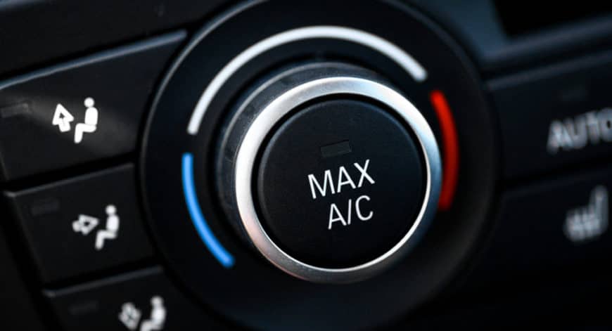 Car climate control knob set to Max A/C