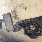 Car radiator and cooling fan on floor