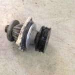 Automotive water pump component on workbench