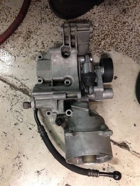 Automotive throttle body or carburetor on floor
