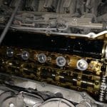 Exposed car engine camshafts with valve cover removed