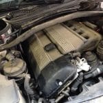 Car engine compartment with inline six-cylinder engine