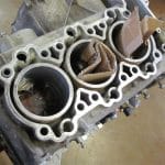 Engine block with cardboard inside cylinders