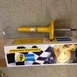 Yellow Bilstein shock absorber on branded box