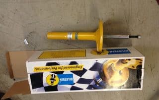 Yellow Bilstein shock absorber on branded box