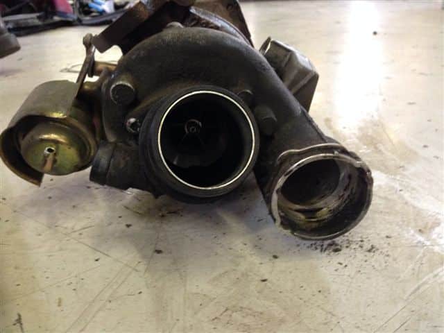 Used turbocharger on workshop floor