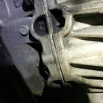 Close-up of motorcycle engine cylinder and casing