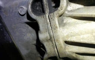 Close-up of motorcycle engine casing and fins