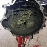 Manual transmission bell housing on repair stand