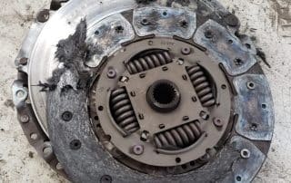 Severely worn and burnt clutch disc