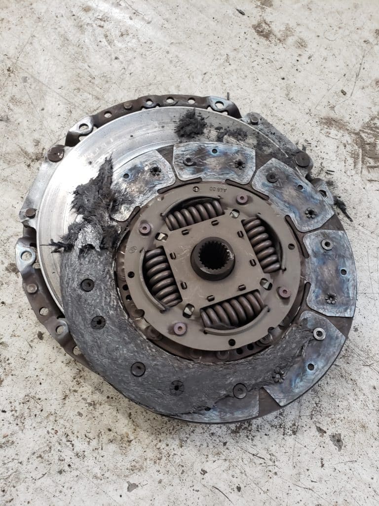 Severely worn and burnt clutch disc