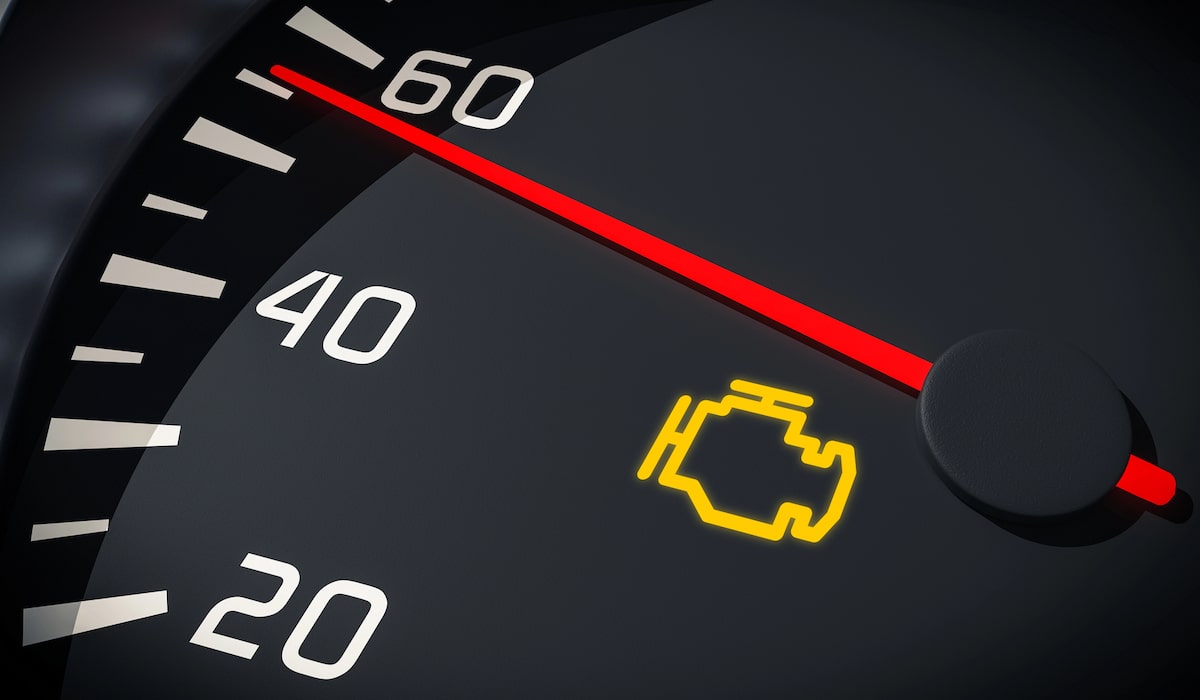 European Car Engine Repair in Denver image Car dashboard with illuminated check engine warning light