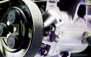 Close-up of automotive engine pulley and assembly