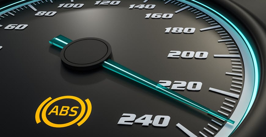 Car speedometer with illuminated ABS warning light