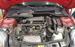 Mini Cooper engine bay with hood open