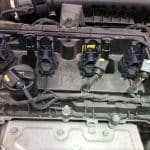 Car engine with exposed ignition coils