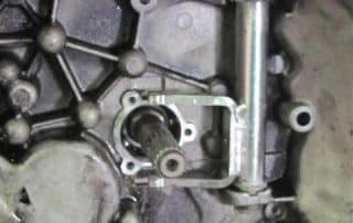 Close-up of gearbox interior with metal shaft