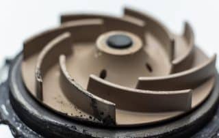 Close-up of mechanical impeller with curved blades