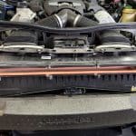 Car engine bay with exposed air filter