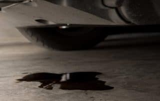 Oil leaking from car onto garage floor