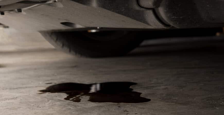 Oil leaking from car onto garage floor