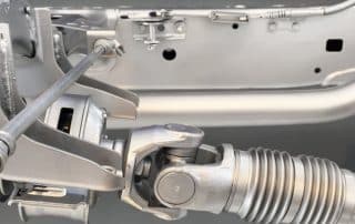 Close-up of vehicle steering shaft and universal joint