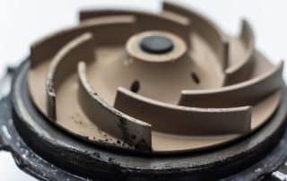Close-up of pump impeller with curved blades