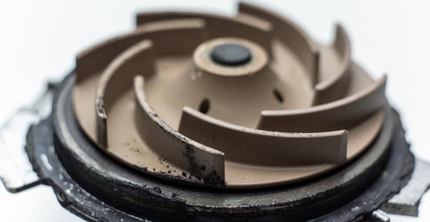 Close-up of pump impeller with curved blades
