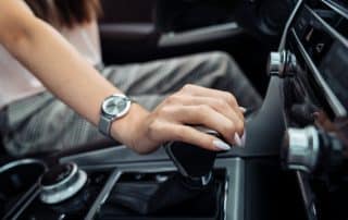 Hand shifting manual gear in modern car
