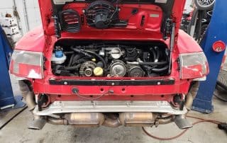 Rear view of red Porsche engine bay