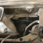 Car engine bay with air intake components