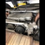 Car engine bay with visible turbo components