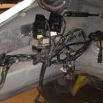 Vehicle chassis interior with wiring and brake components