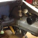 Car engine bay with fuel pump and filter