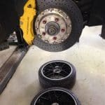 Porsche brake rotor and caliper with wheels