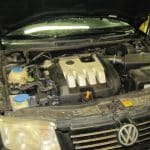 Open Volkswagen hood showing engine compartment