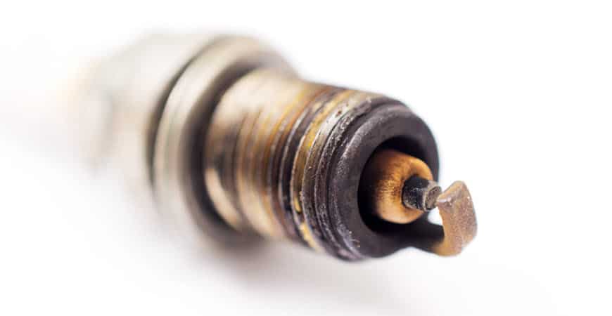 Close-up of a worn spark plug tip