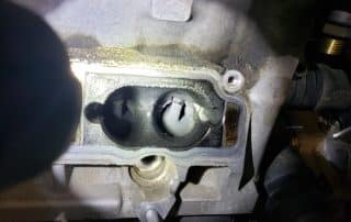 Close-up of damaged engine intake port