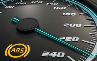 Car speedometer with ABS warning light illuminated
